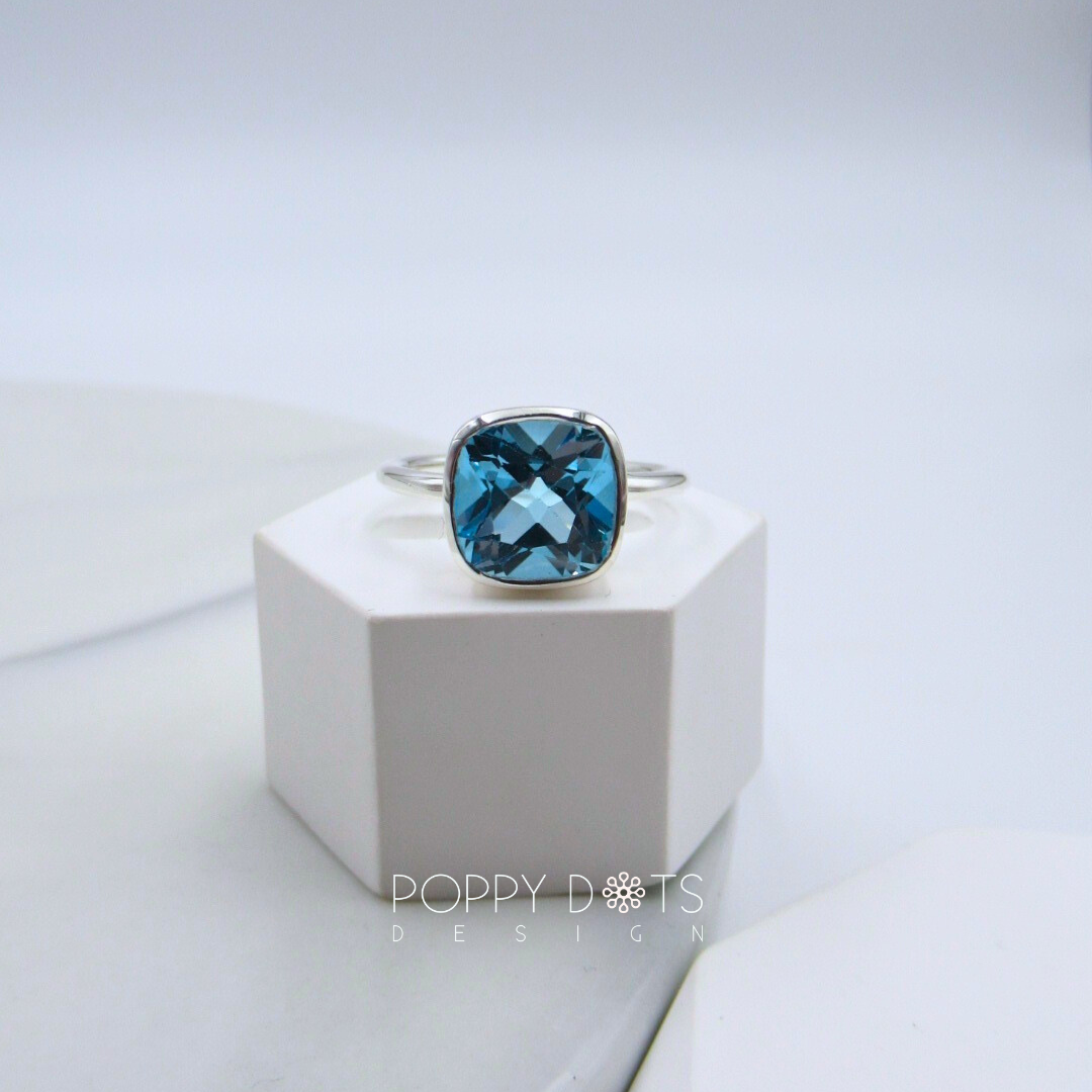 Luxurious Sterling Silver Square Blue Topaz Ring