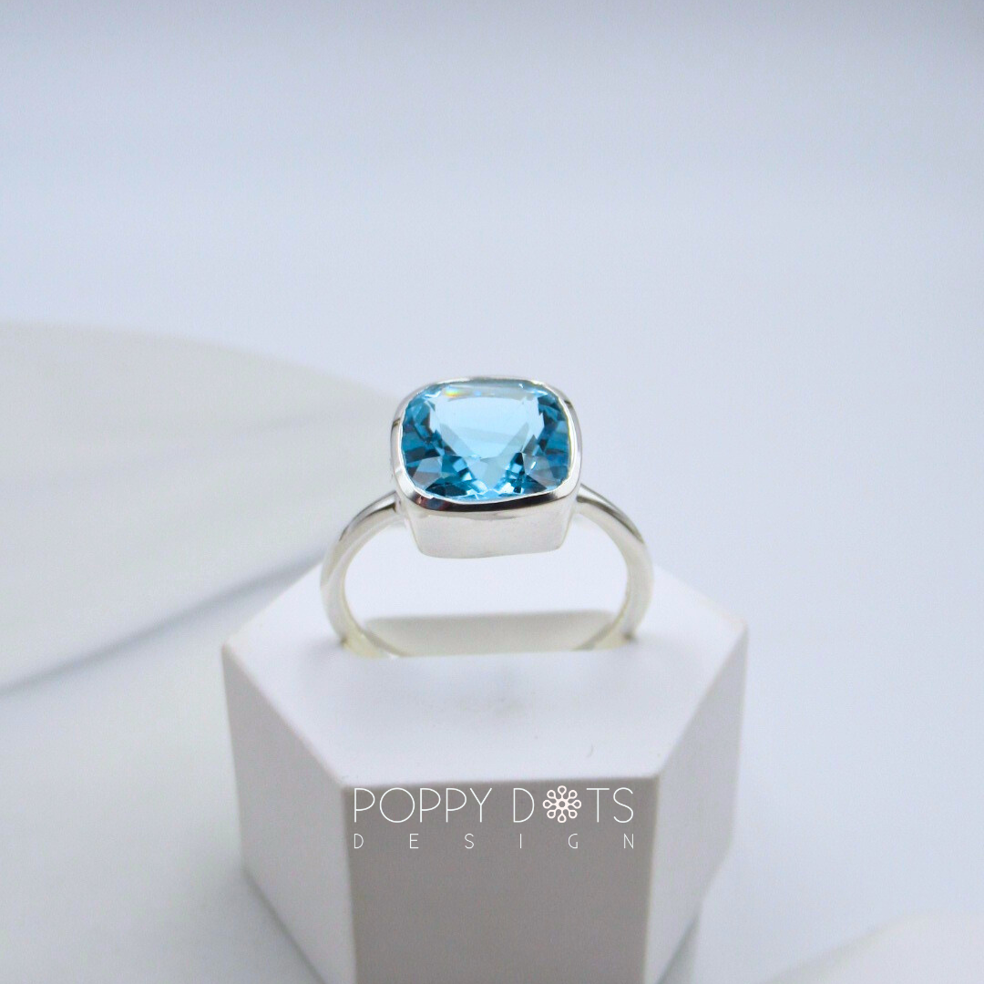 Luxurious Sterling Silver Square Blue Topaz Ring