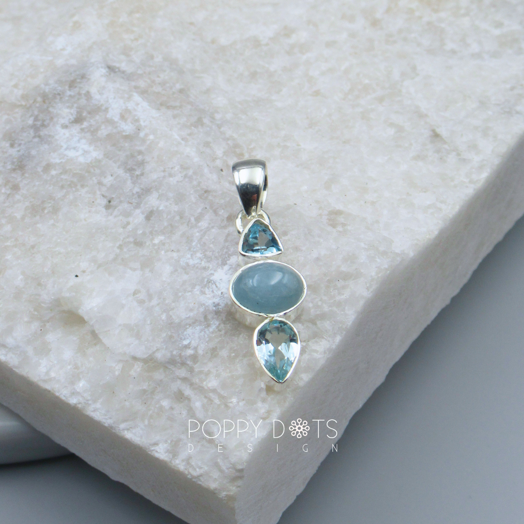 Exclusive Sterling Silver Blue Topaz and Blue Onyx Pendant
