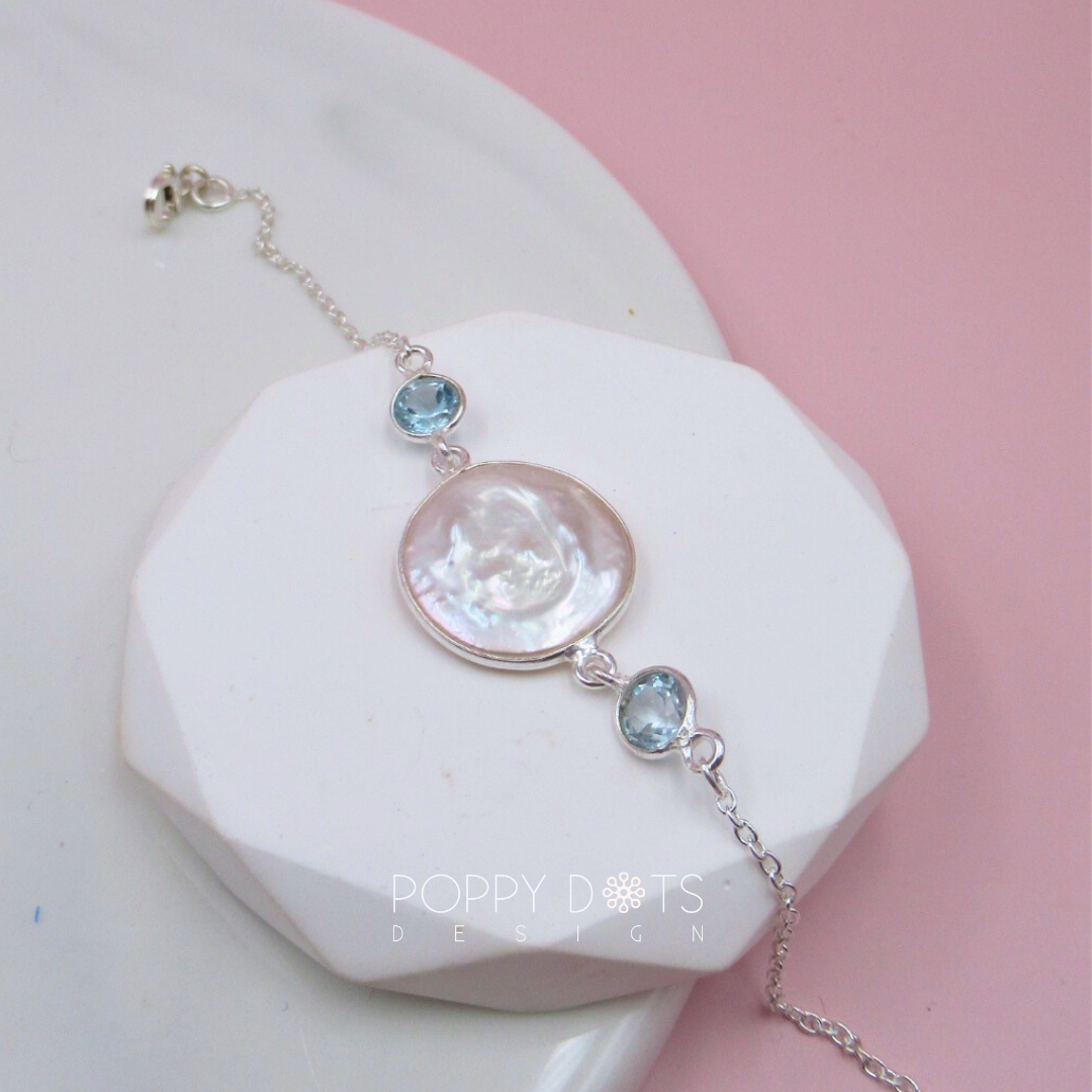 Sterling Silver Freshwater Coin Pearl and Blue Topaz Bracelet
