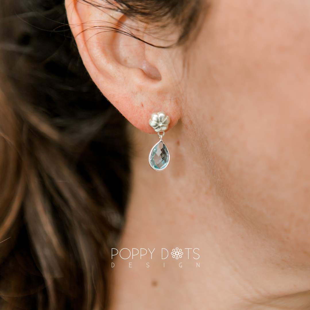 Sterling Silver Teardrop Blue Topaz Studs