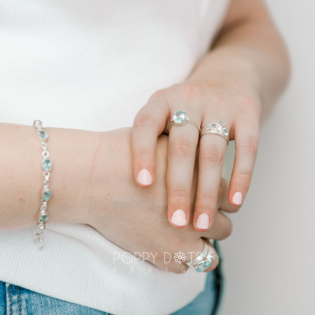 Sterling Silver Multi Band Oval Blue Topaz Ring