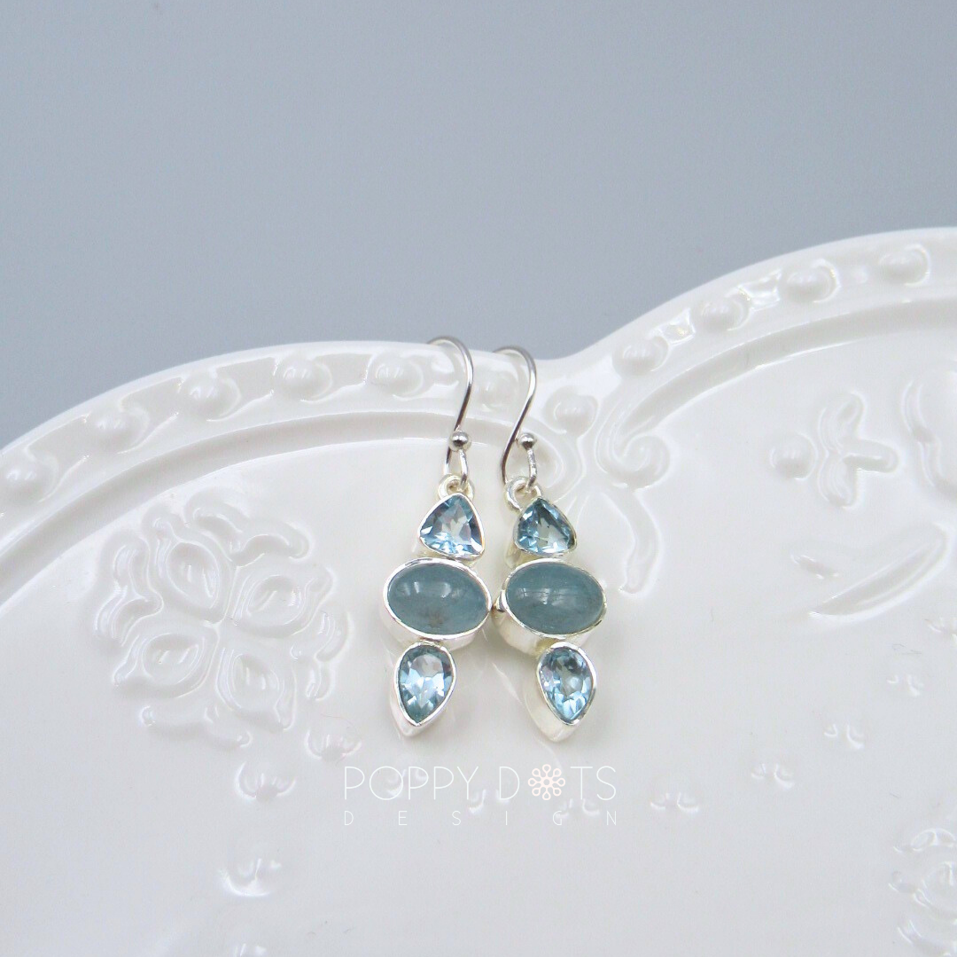 Luxurious Sterling Silver Blue Topaz Earrings and Pendant Set