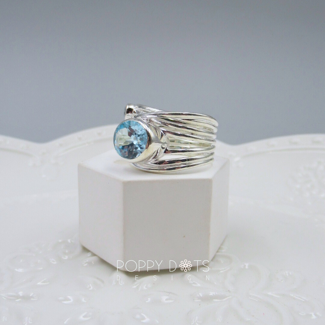 Sterling Silver Multi Band Oval Blue Topaz Ring