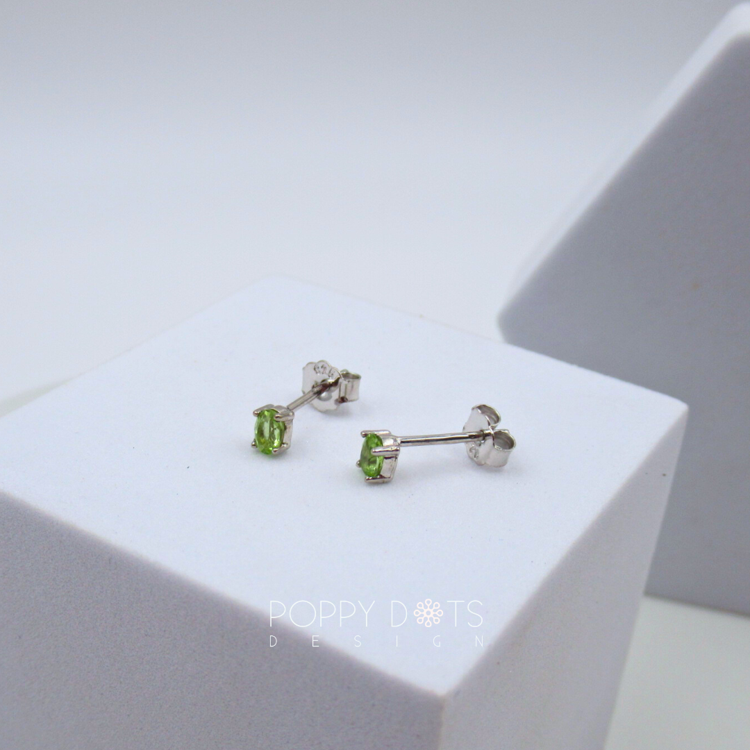 Sterling Silver Oval Peridot Claw Studs