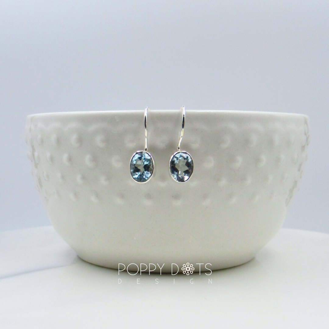 Sterling Silver fixed hook Oval Blue Topaz Earrings