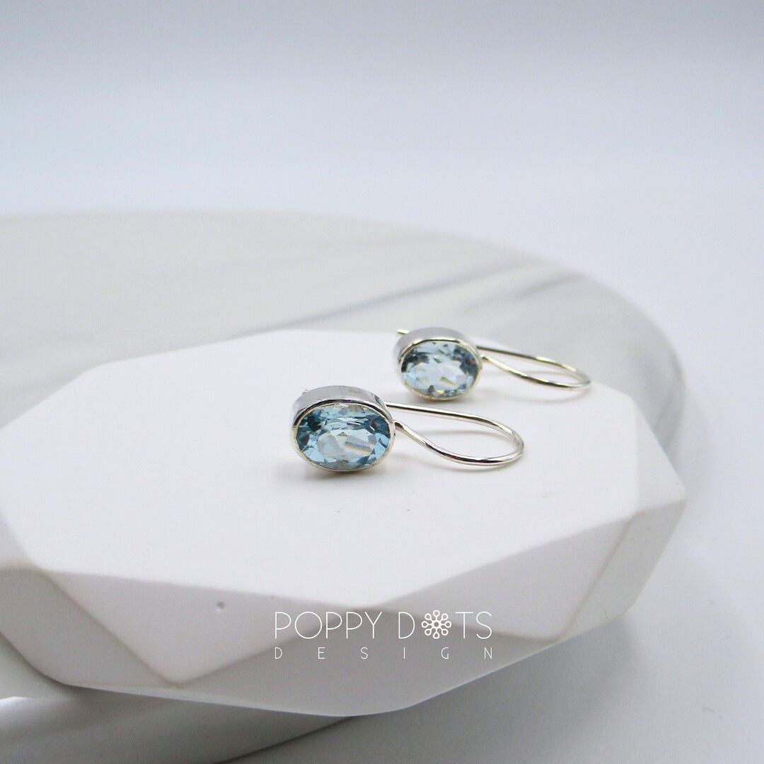 Sterling Silver fixed hook Oval Blue Topaz Earrings