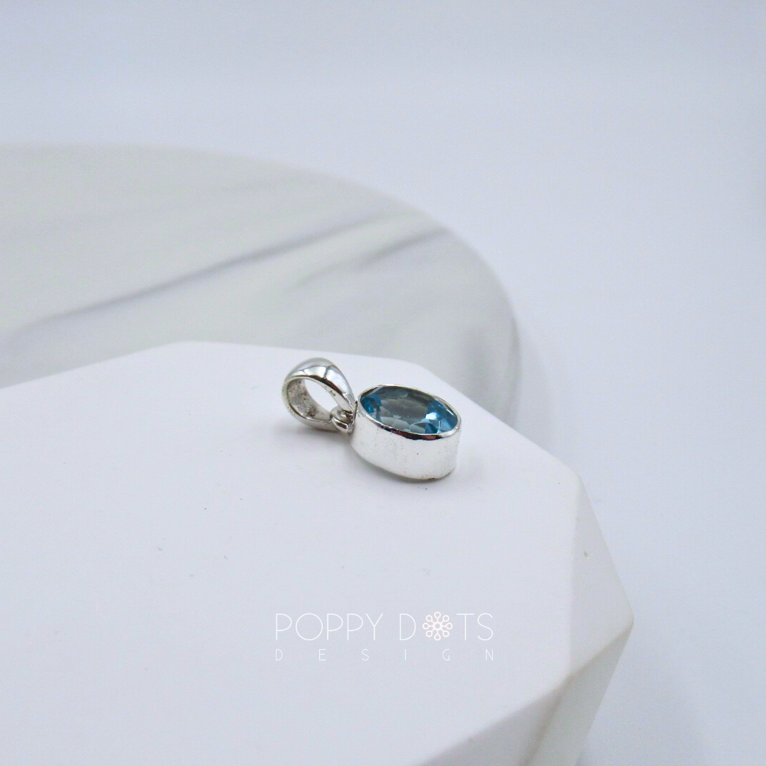 Sterling Silver Blue Topaz Oval Pendant