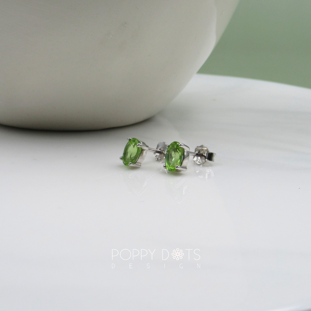 Sterling Silver Oval Peridot Claw Studs (7mm x 5mm)
