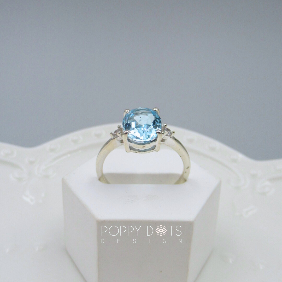 Sterling Silver Oval Solitaire Blue Topaz Ring