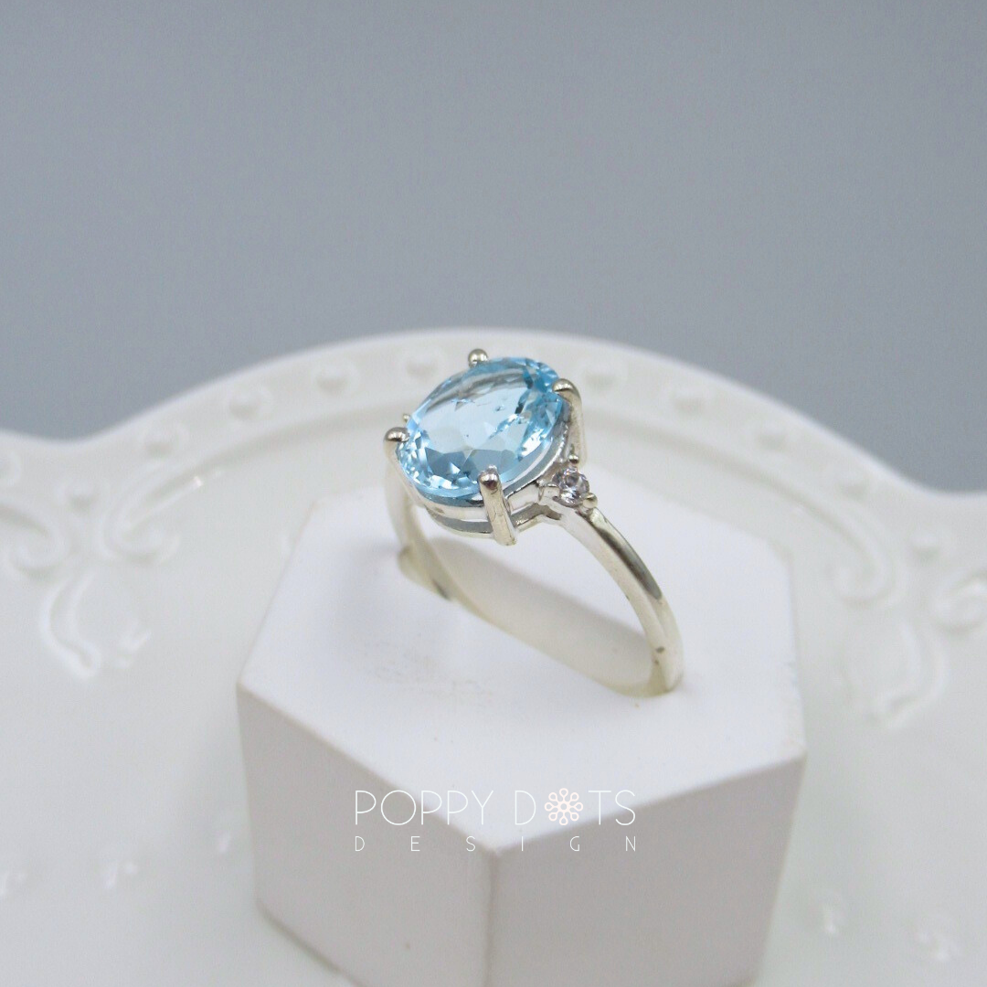 Sterling Silver Oval Solitaire Blue Topaz Ring