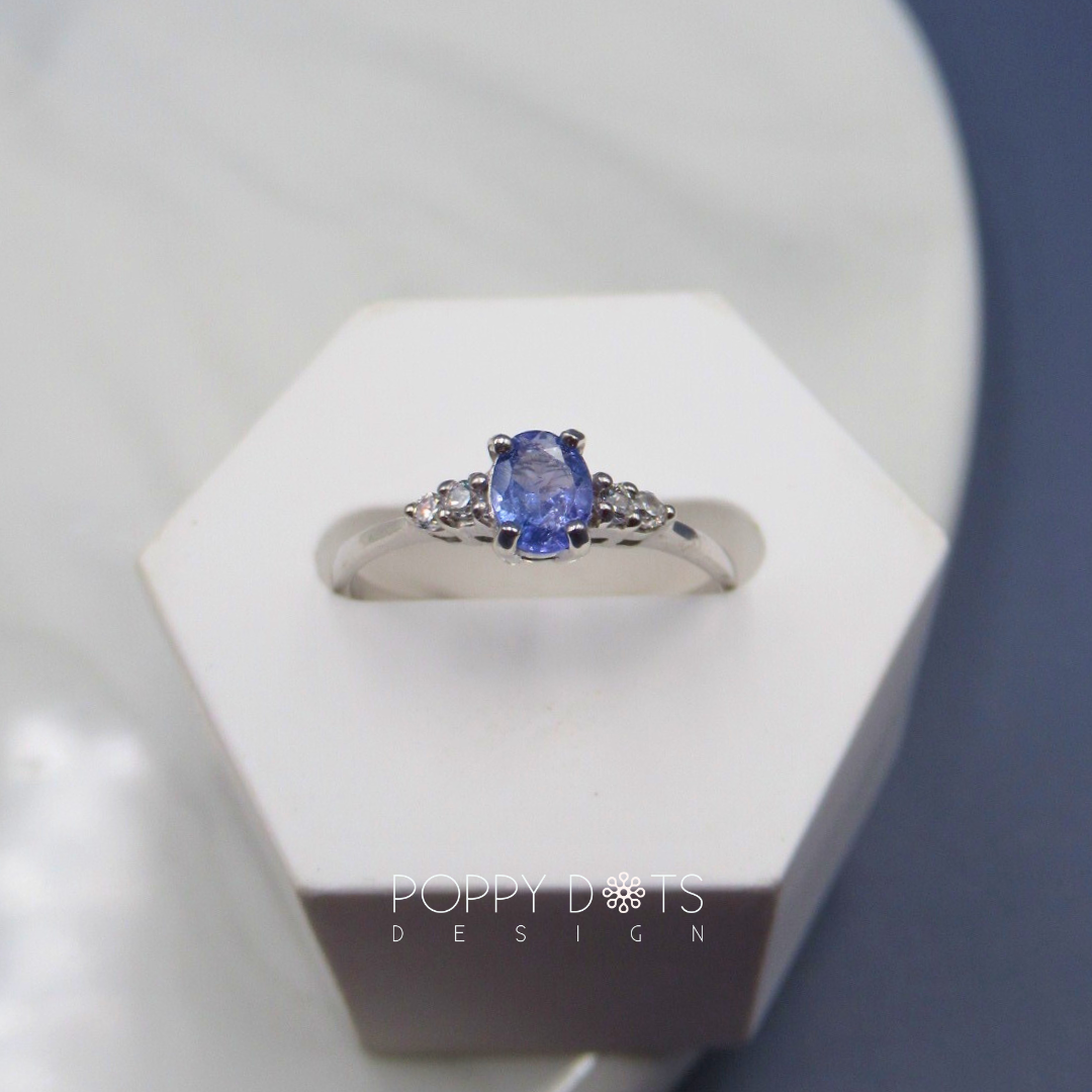 Sterling Silver Oval Tanzanite Ring with Double White Topaz