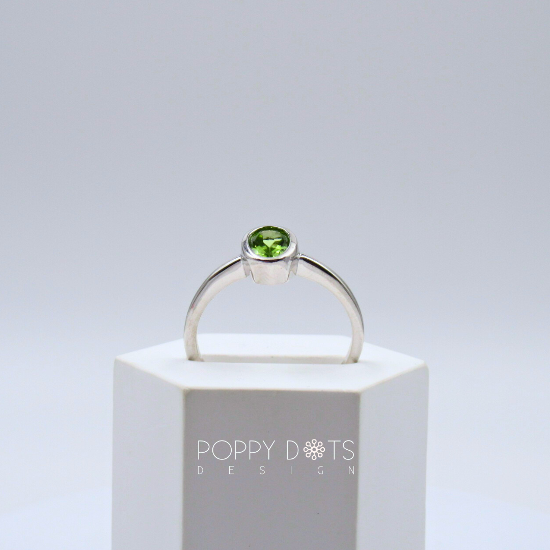 Sterling Silver Classic Oval Tube Set Peridot Ring