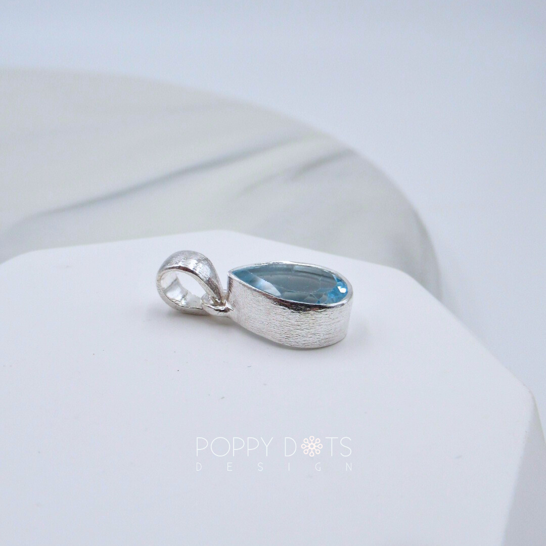 Sterling Silver Blue Topaz Teardrop Pendant (8x10mm)