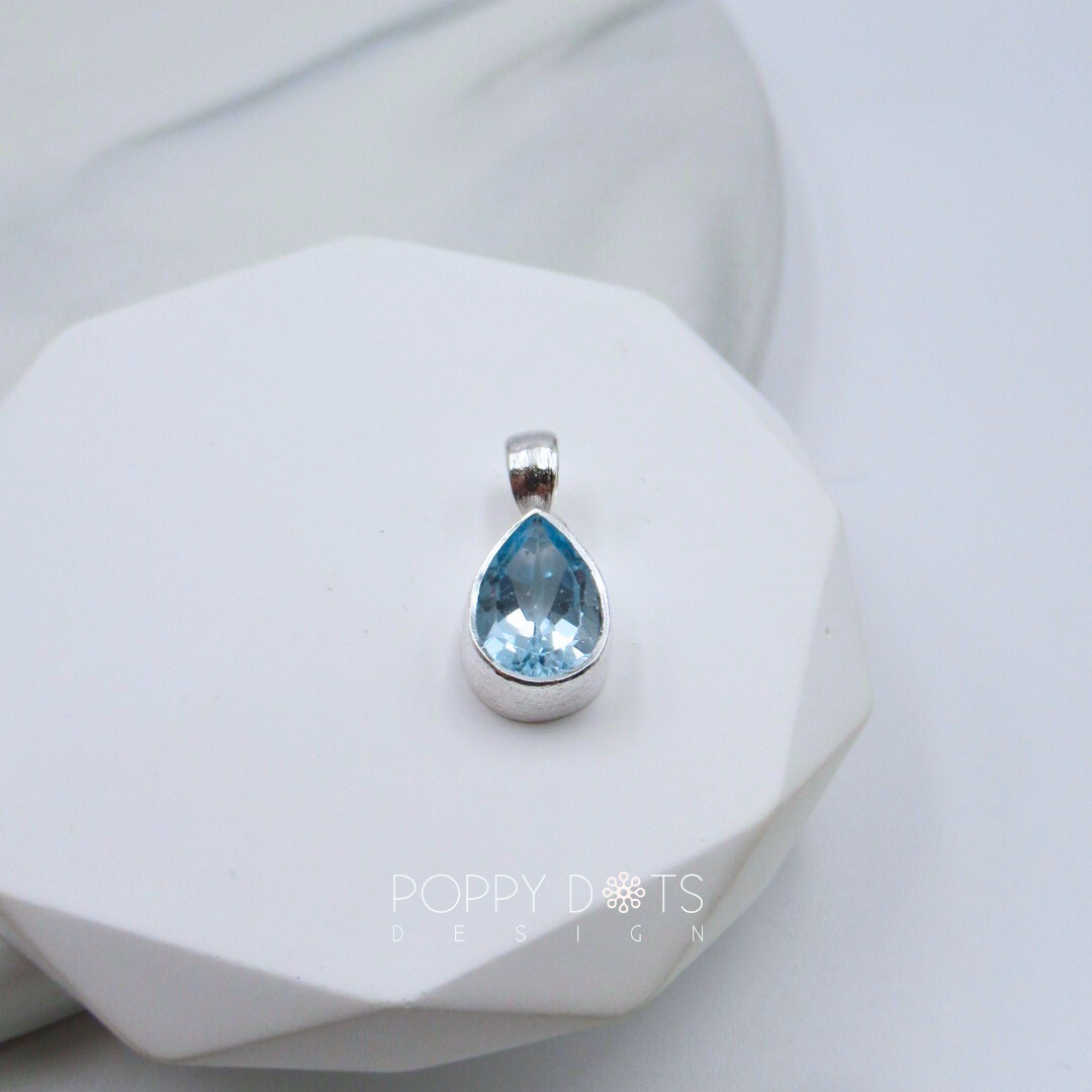 Sterling Silver Blue Topaz Teardrop Pendant (8x10mm)