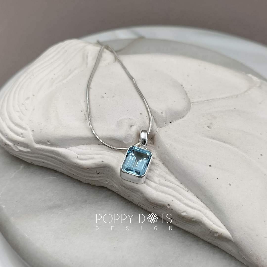 Sterling Silver Rectangular Blue Topaz Pendant