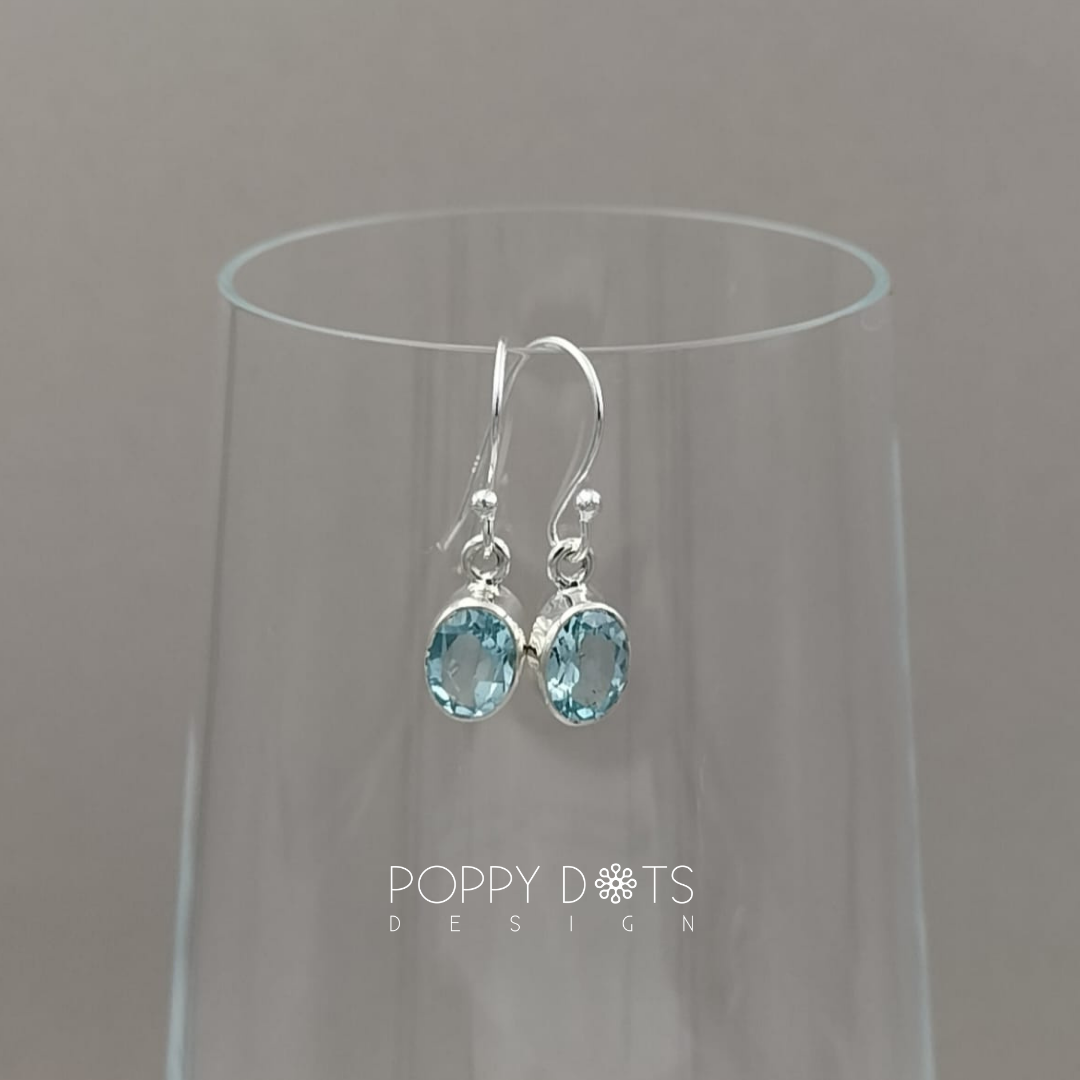 Sterling Silver Blue Topaz Oval Earrings