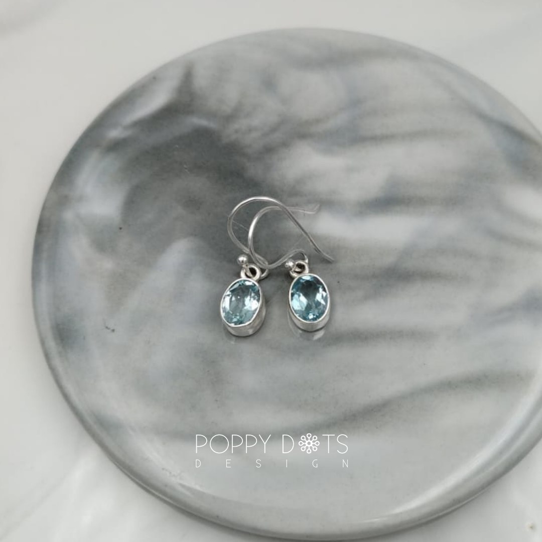 Sterling Silver Blue Topaz Oval Earrings
