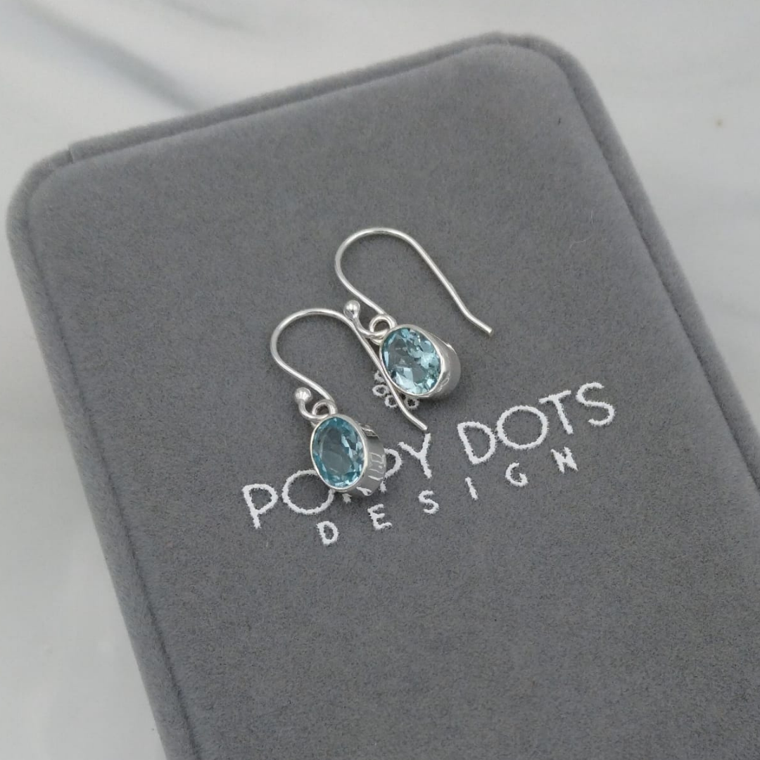 Sterling Silver Blue Topaz Oval Earrings