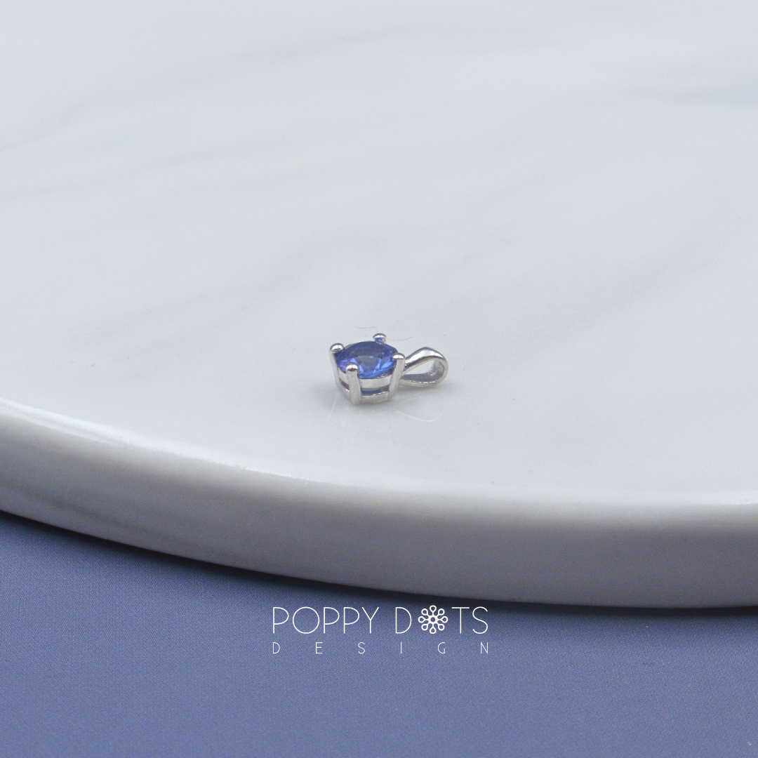 Sterling Silver Claw Set Round Tanzanite Pendant (0,56 ct)