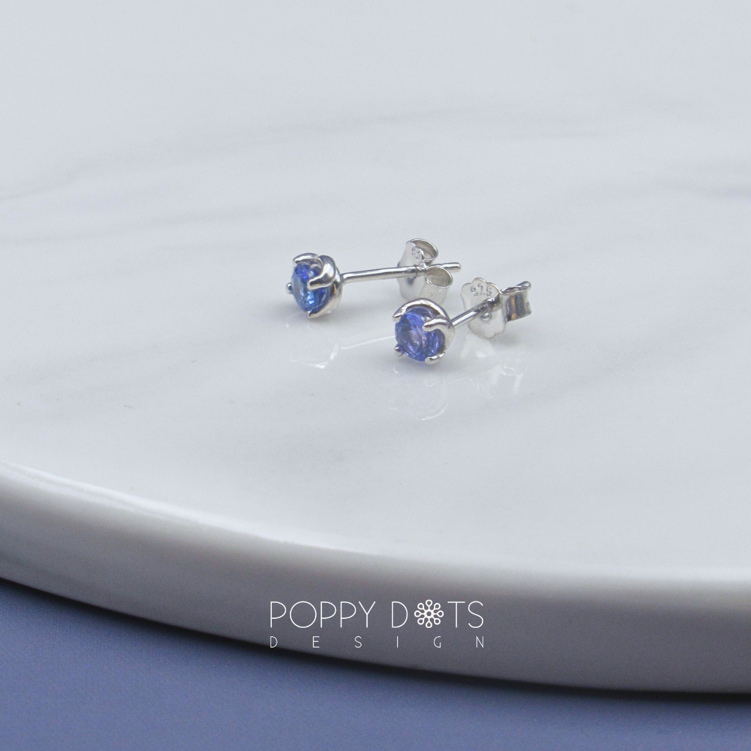 Sterling Silver Curved Claw Set Round Tanzanite Studs (0.46ct)