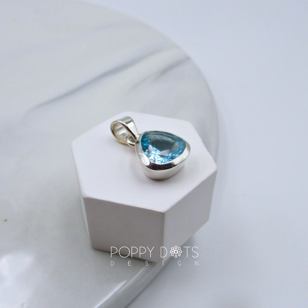 Sterling Silver Blue Topaz Trillion Earring and Pendant Set