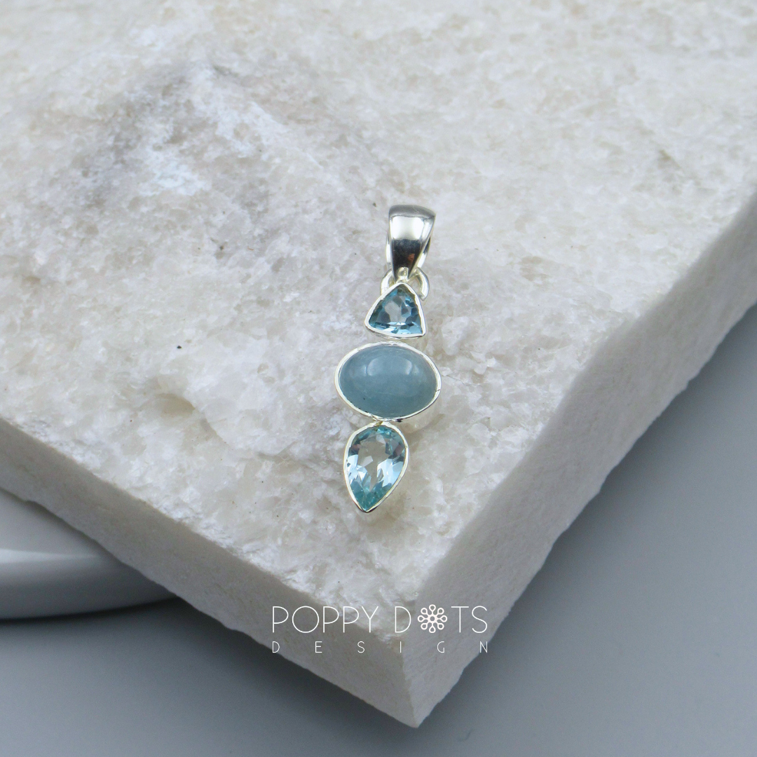 Exclusive Sterling Silver Blue Topaz and Blue Onyx Pendant