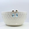 Sterling Silver Teardrop Blue Topaz Studs