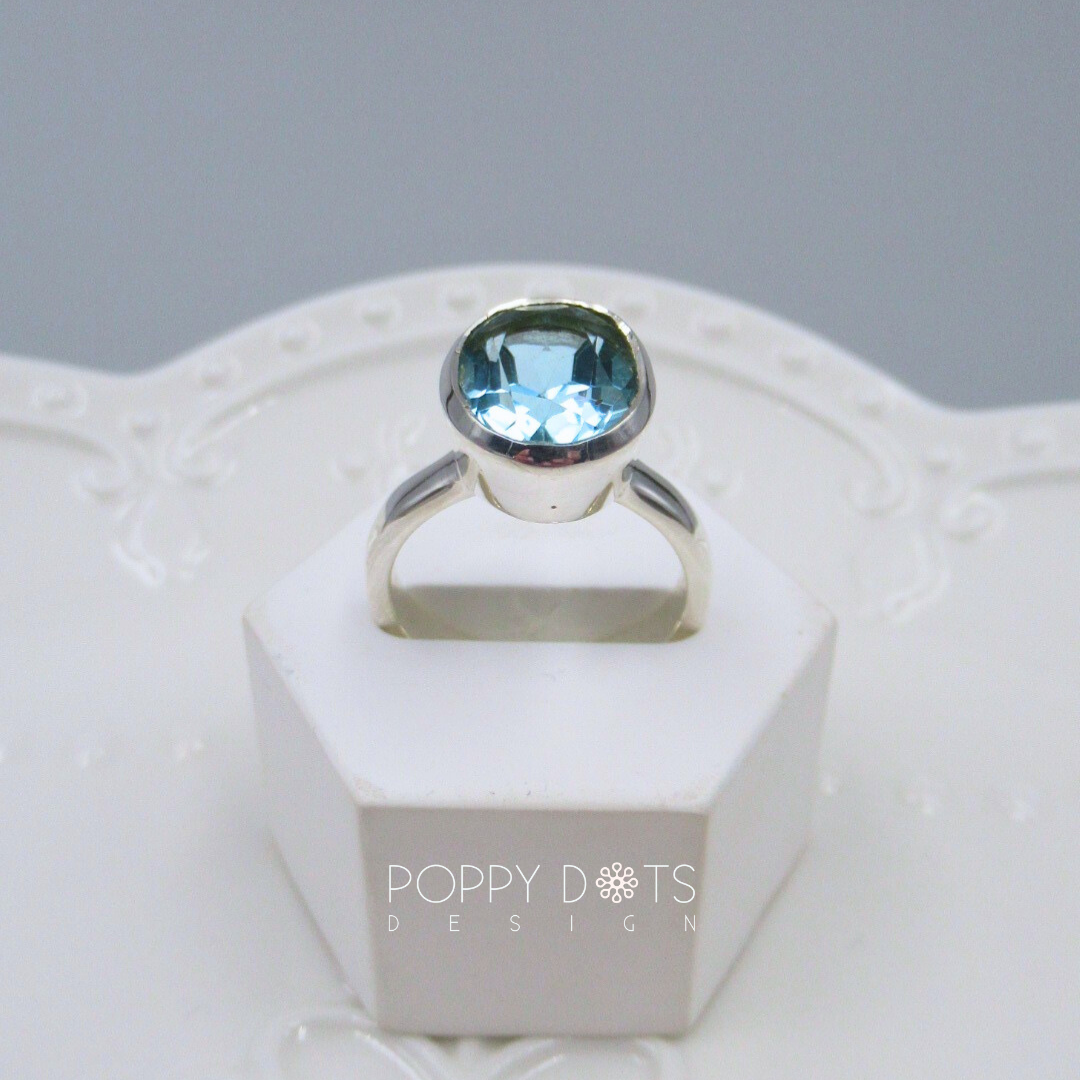Luxurious Sterling Silver Oval Blue Topaz Ring