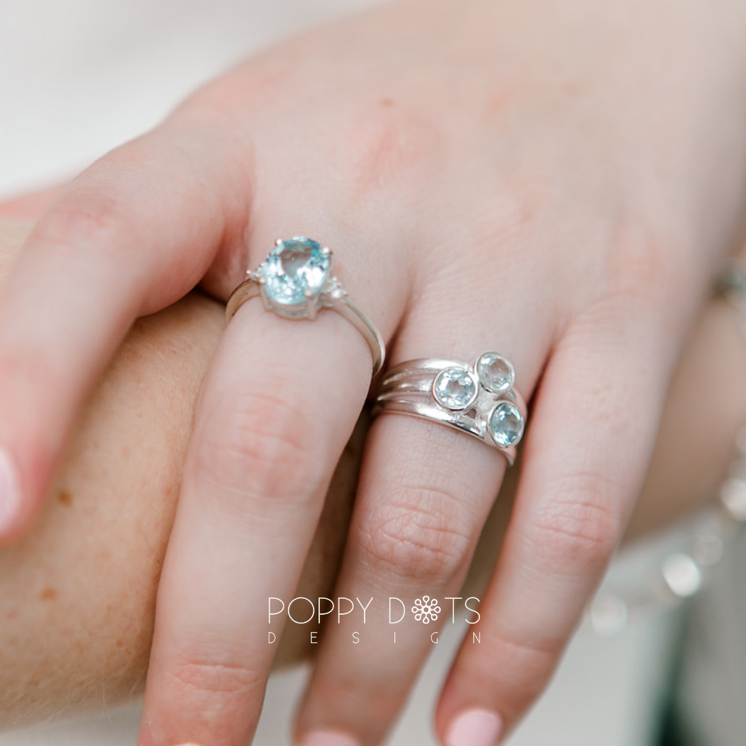 Sterling Silver Oval Solitaire Blue Topaz Ring