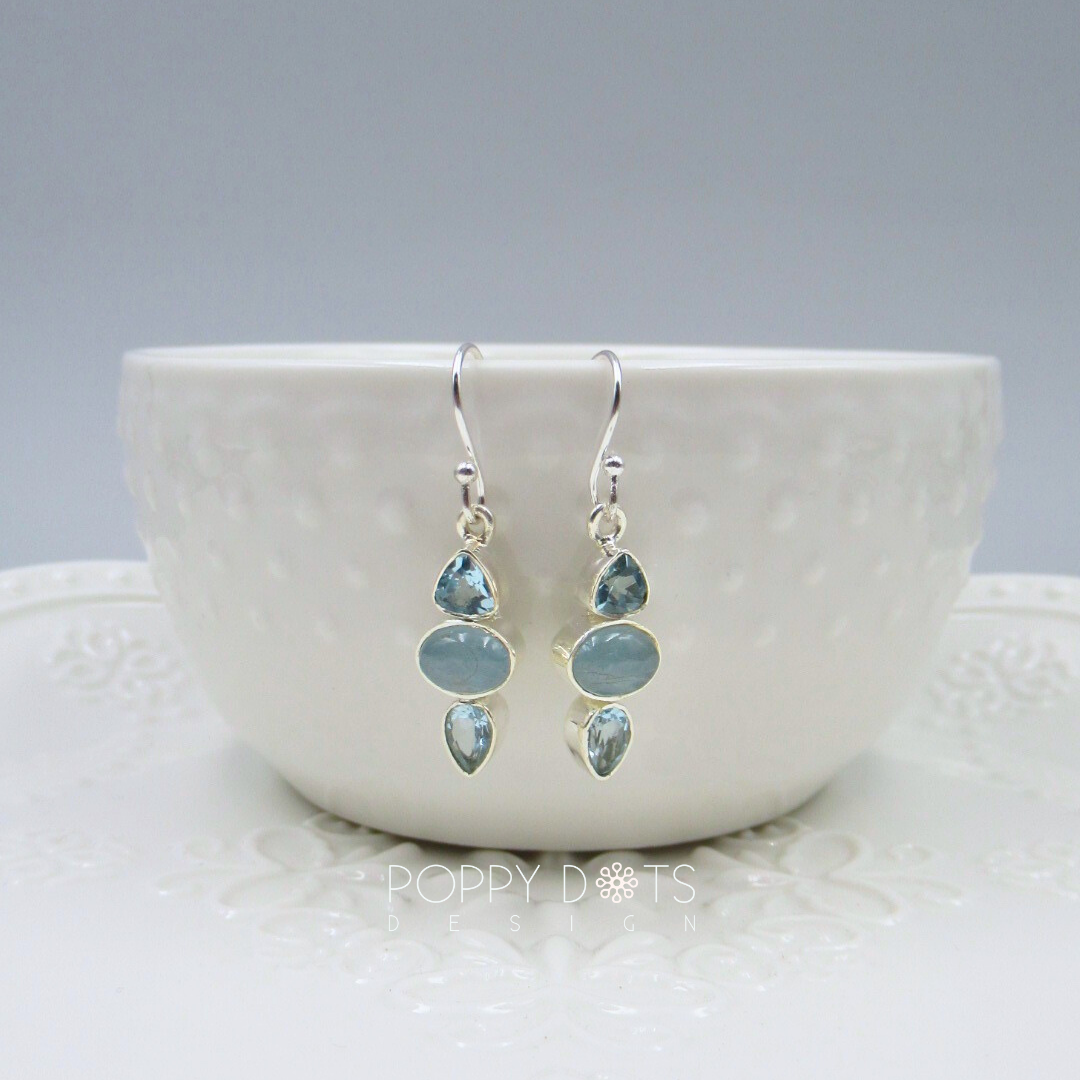 Luxurious Sterling Silver Blue Topaz Earrings and Pendant Set