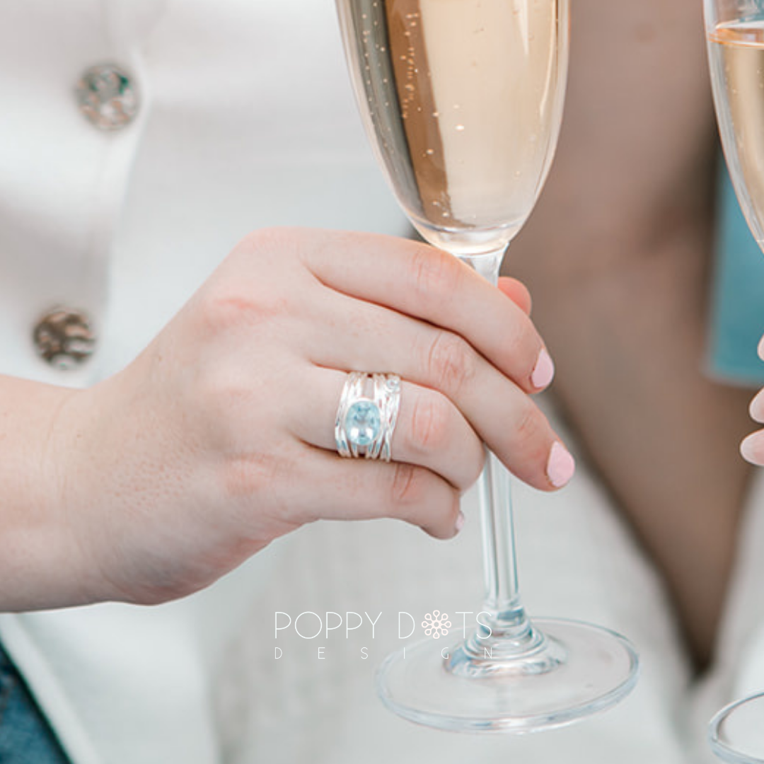 Sterling Silver Multi Band Oval Blue Topaz Ring
