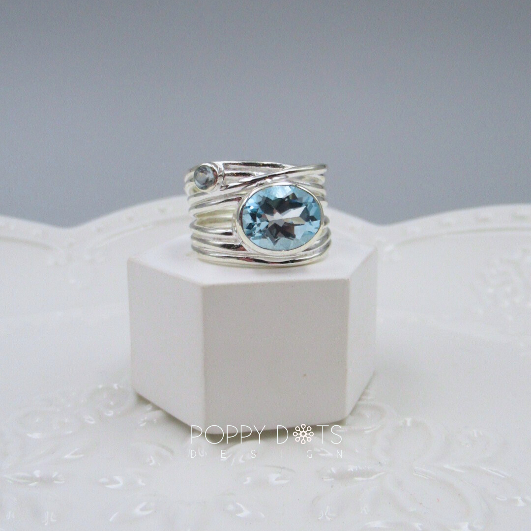 Sterling Silver Multi Band Oval Blue Topaz Ring
