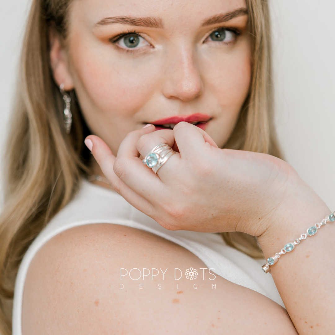 Sterling Silver Multi Band Oval Blue Topaz Ring