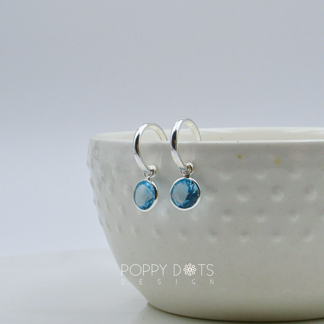 Sterling Silver Pretty Woman Round Light Blue Zirconia Earrings