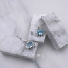 Sterling Silver Detailed Oval Blue Topaz Earrings