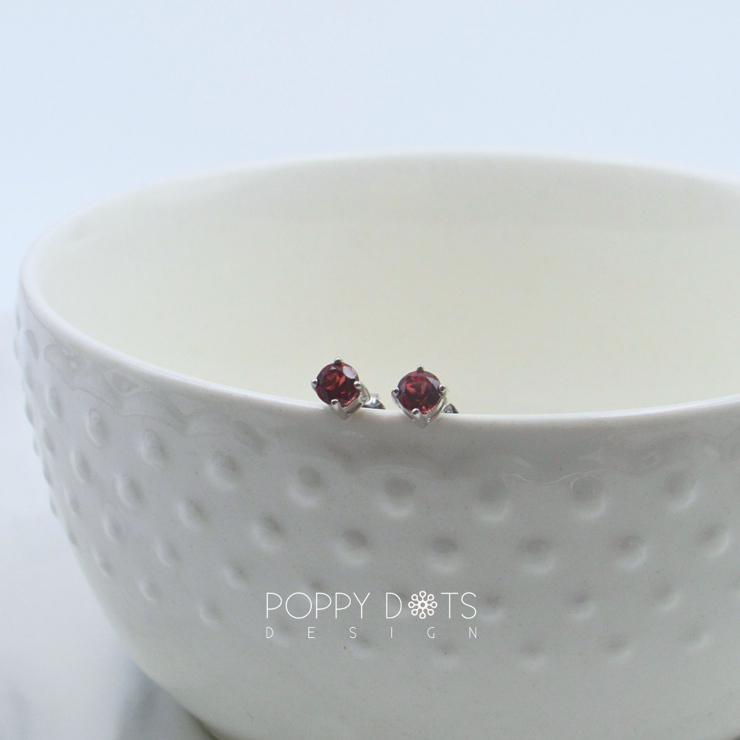Sterling Silver Claw Set Garnet Studs