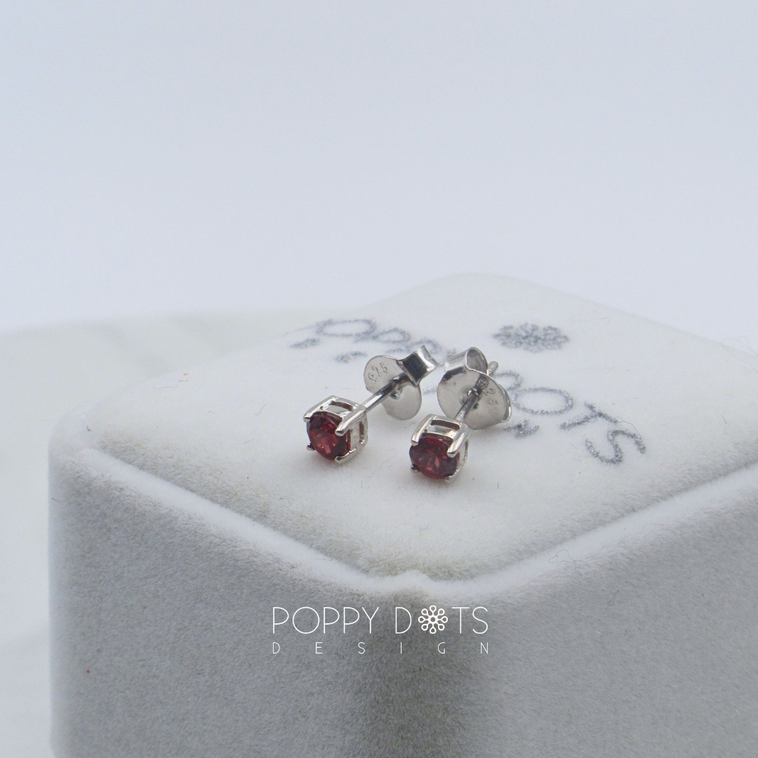 Sterling Silver Claw Set Garnet Studs
