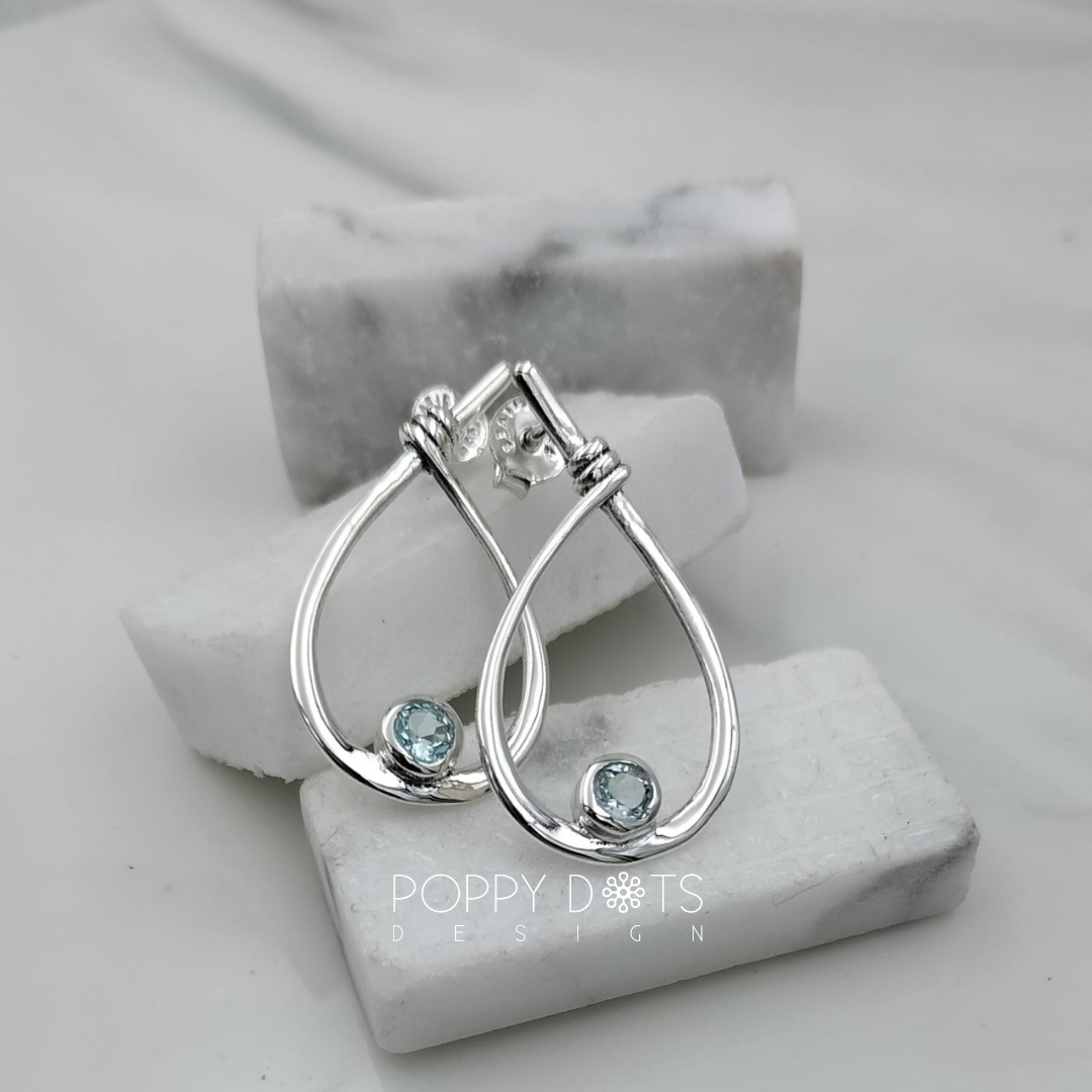 Sterling Silver Modern Teadrop Blue Topaz Studs