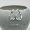Sterling Silver Modern Teadrop Blue Topaz Studs