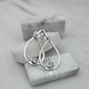 Sterling Silver Modern Teadrop Blue Topaz Studs