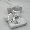 Load image into Gallery viewer, Sterling Silver Modern Teadrop Blue Topaz Studs