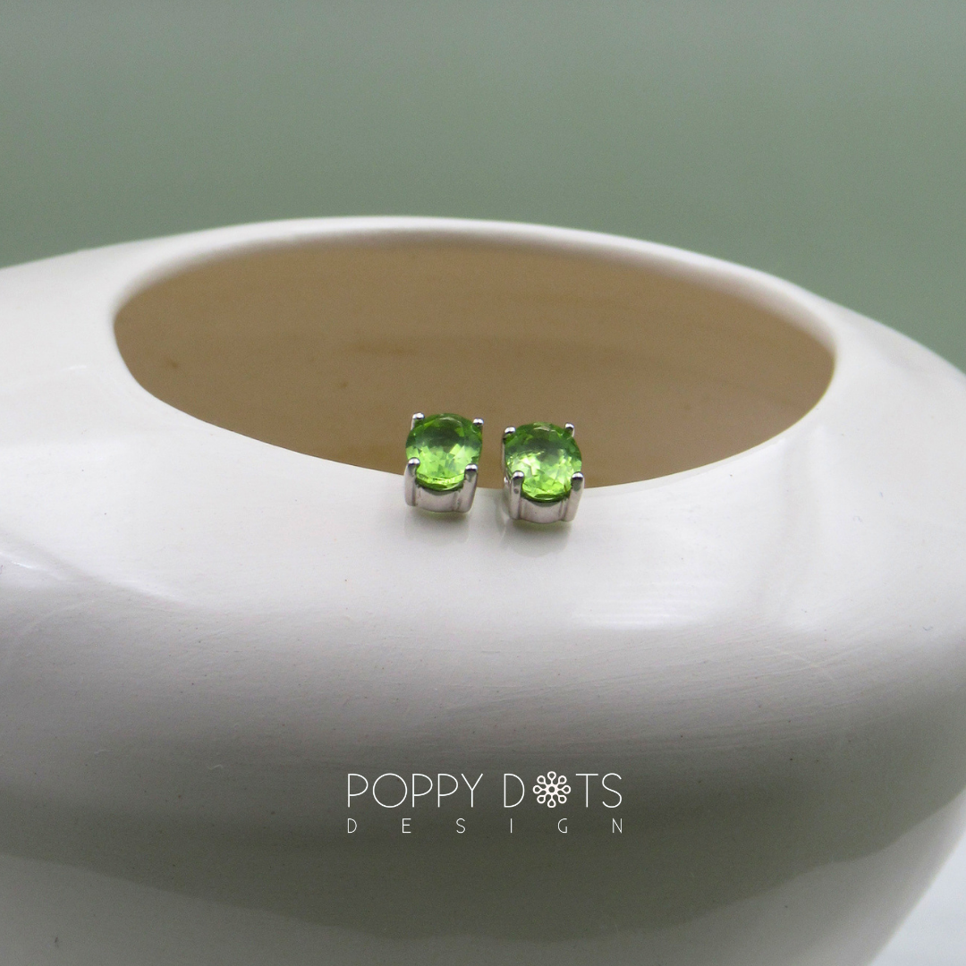 Sterling Silver Oval Peridot Claw Studs (7mm x 5mm)