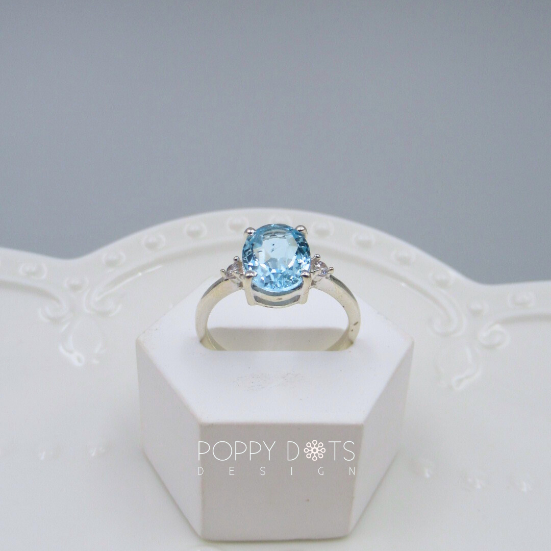 Sterling Silver Oval Solitaire Blue Topaz Ring