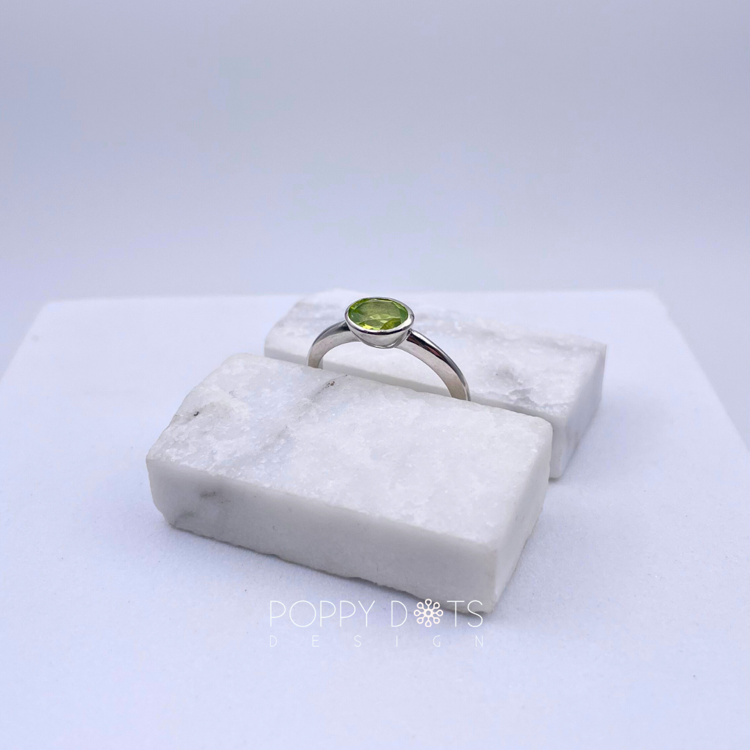 Sterling Silver Oval Tube Set Peridot Ring