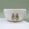 Luxurious Sterling Silver Filigree Oval Peridot Earrings