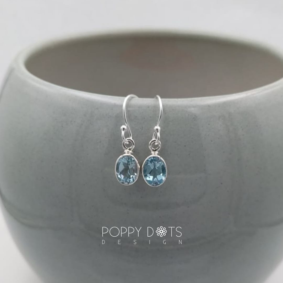 Sterling Silver Blue Topaz Oval Earrings