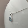Load image into Gallery viewer, Sterling Silver Blue Topaz Teardrop Pendant (9mm x 12mm)